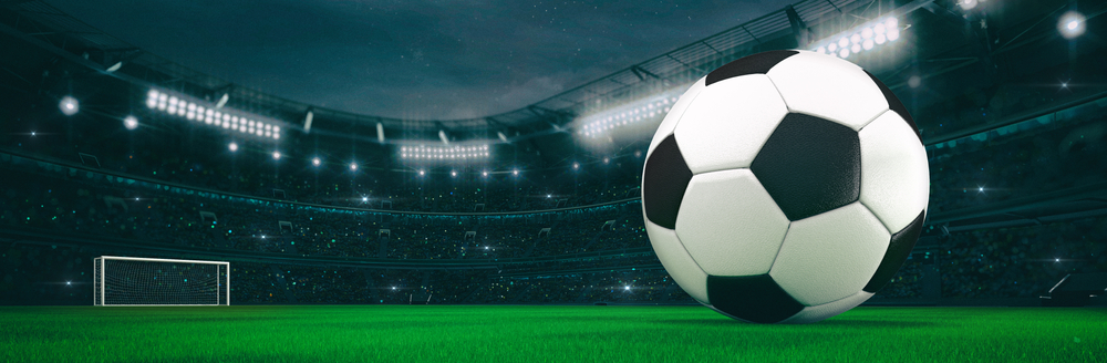 Sport,Stadium,With,Soccer,Ball,At,Night,As,Wide,Backdrop. O que e sistema de banca de apostas online
