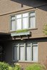 210 North Grand Avenue (1906); detail casement windows and window box