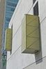 Detail, four story annex, street facing short walls with box-like lighting fixtures