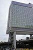 57 foot tall pilotis, raising building over High Line Park