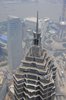 Aerial context view, tower top evoking the architecture of the traditional Chinese pagoda