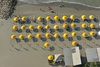 General view: Aerial view of Playa De Bocagrande, looking down, depicting beach umbrellas
