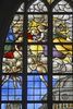 Adoration of the Shepherds window, detail, top, elaborate architectural setting and angels