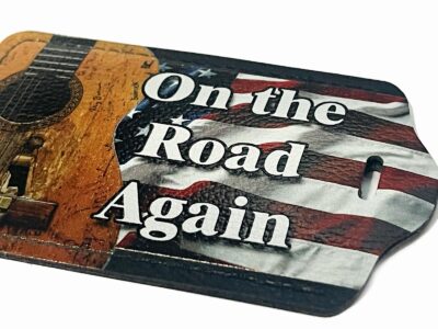 Willie Nelson On the Road Again Trigger Leather Guitar Case tag closeup