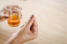 can you drink while taking prednisone