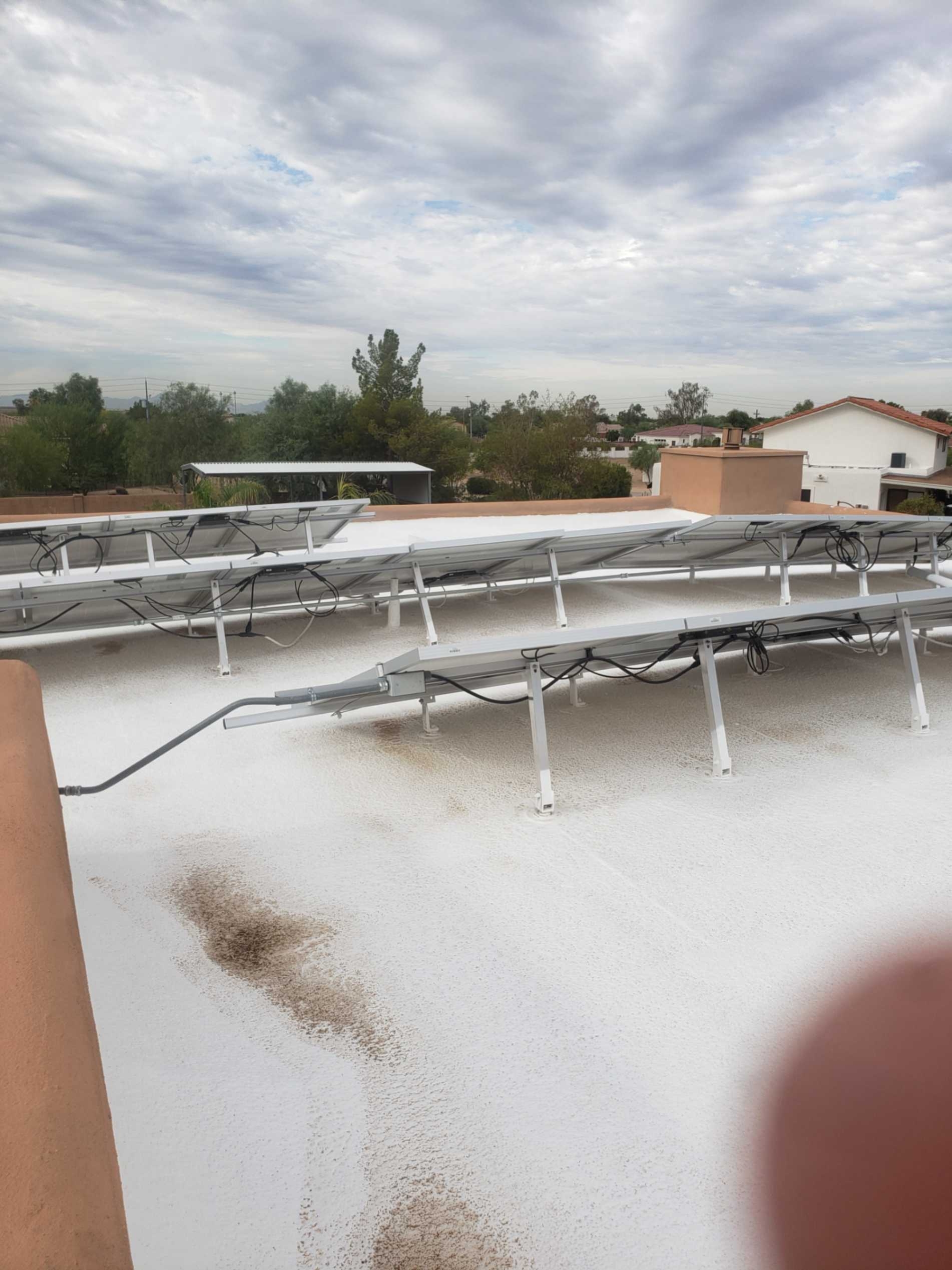 What are the installation steps for spray foam roofing?