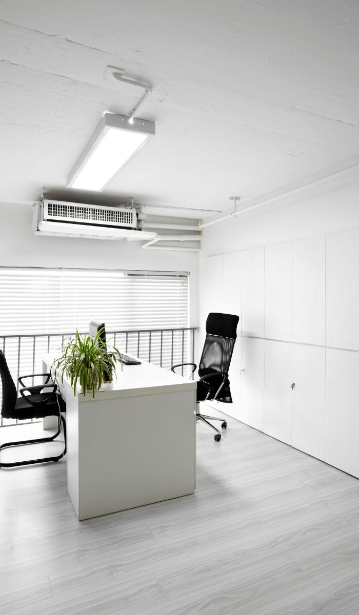 What equipment do commercial cleaners use for window cleaning?