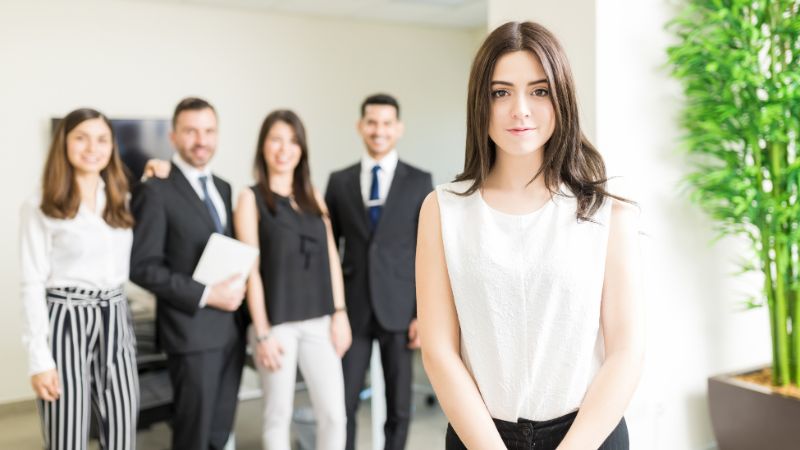 How do international employee handbooks differ from domestic ones?