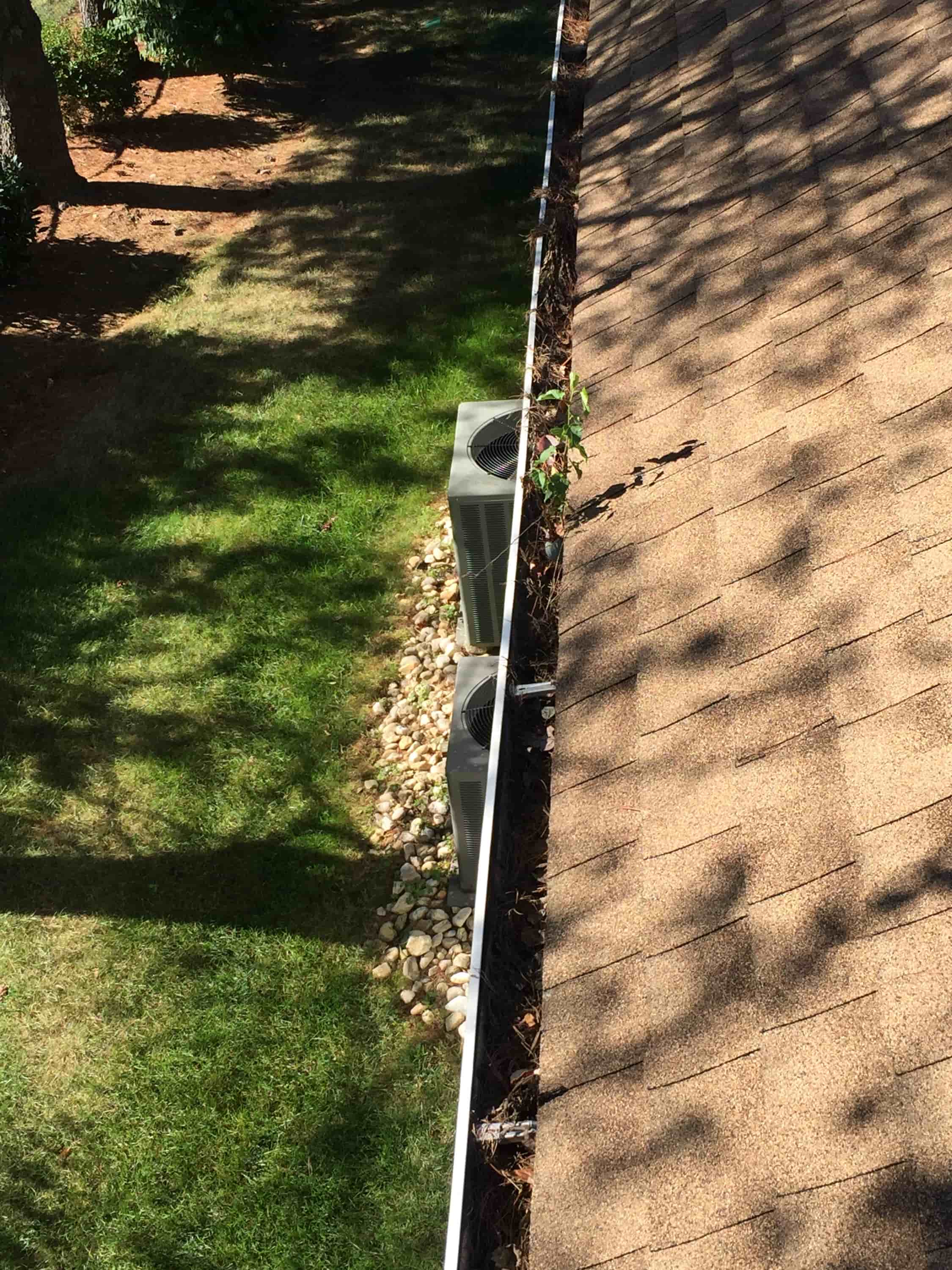 best way to clean clogged downspouts