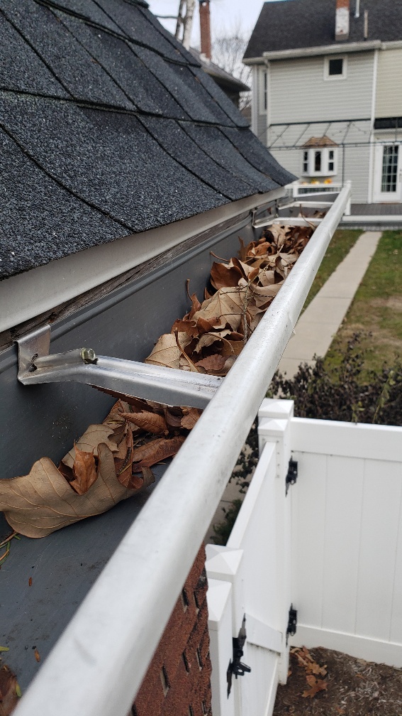 how to clean tall gutters