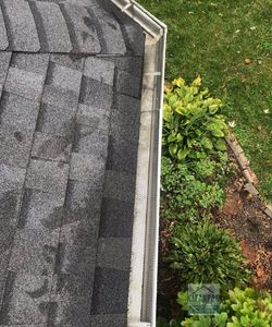 cleaning gutters on second story