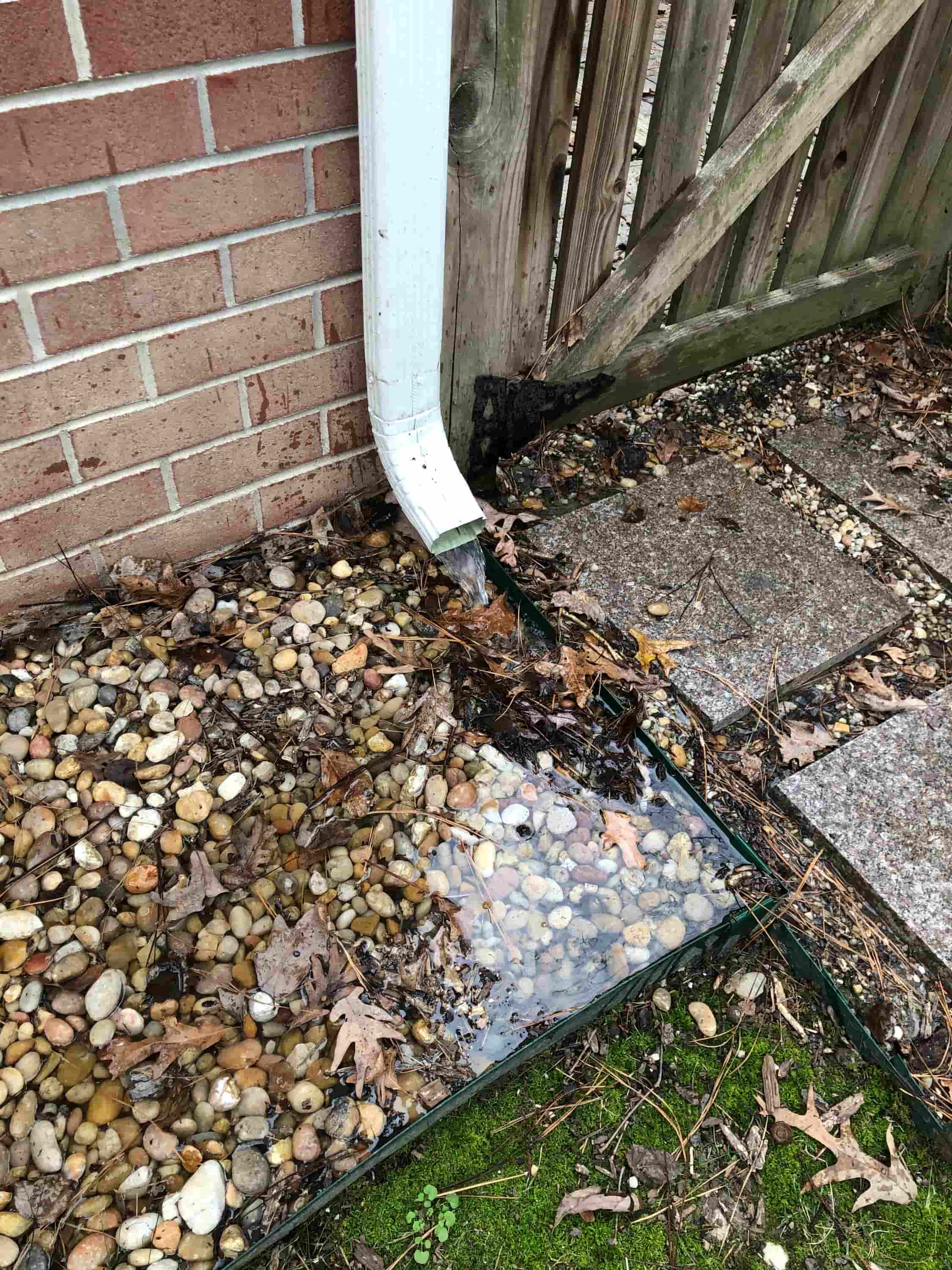 cleaning gutter downspout