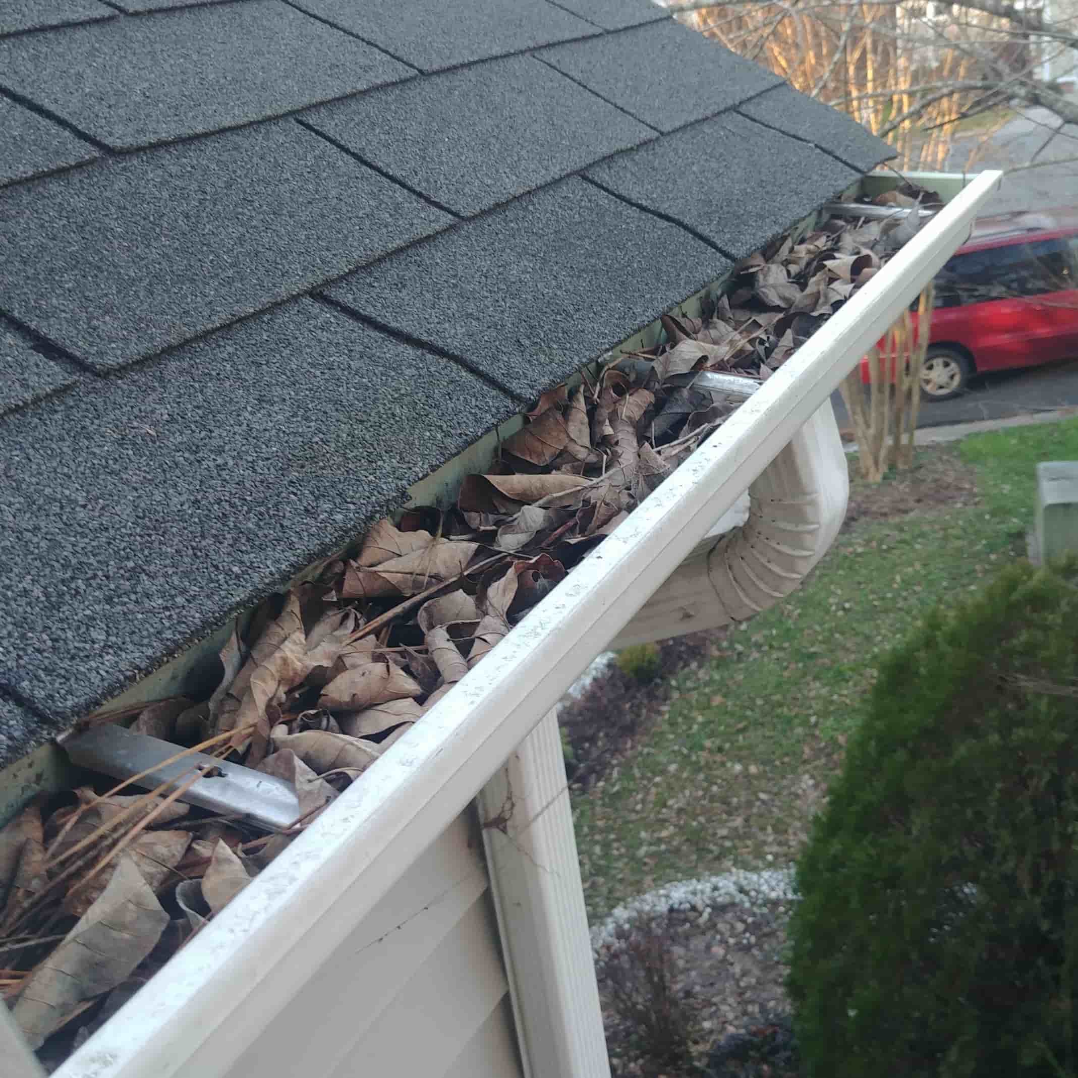 how to clean gutters pressure washer