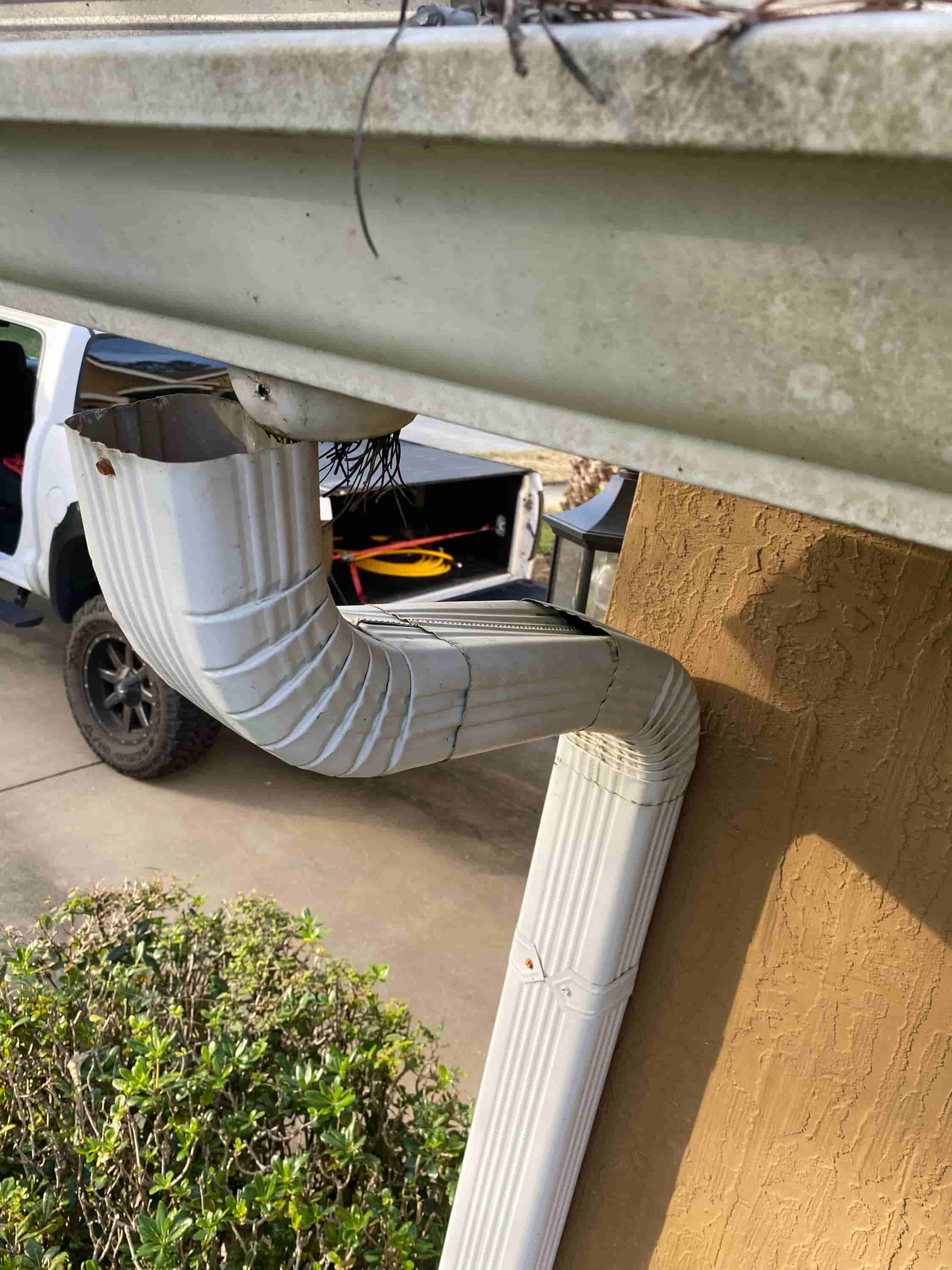 how to clean gutter drains