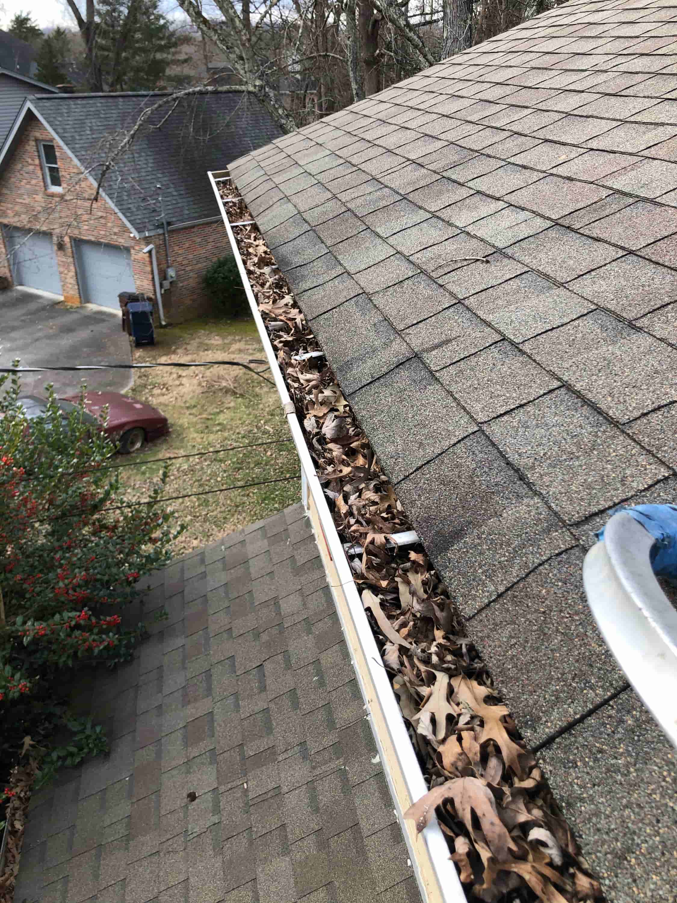 how to clean out gutter downspouts