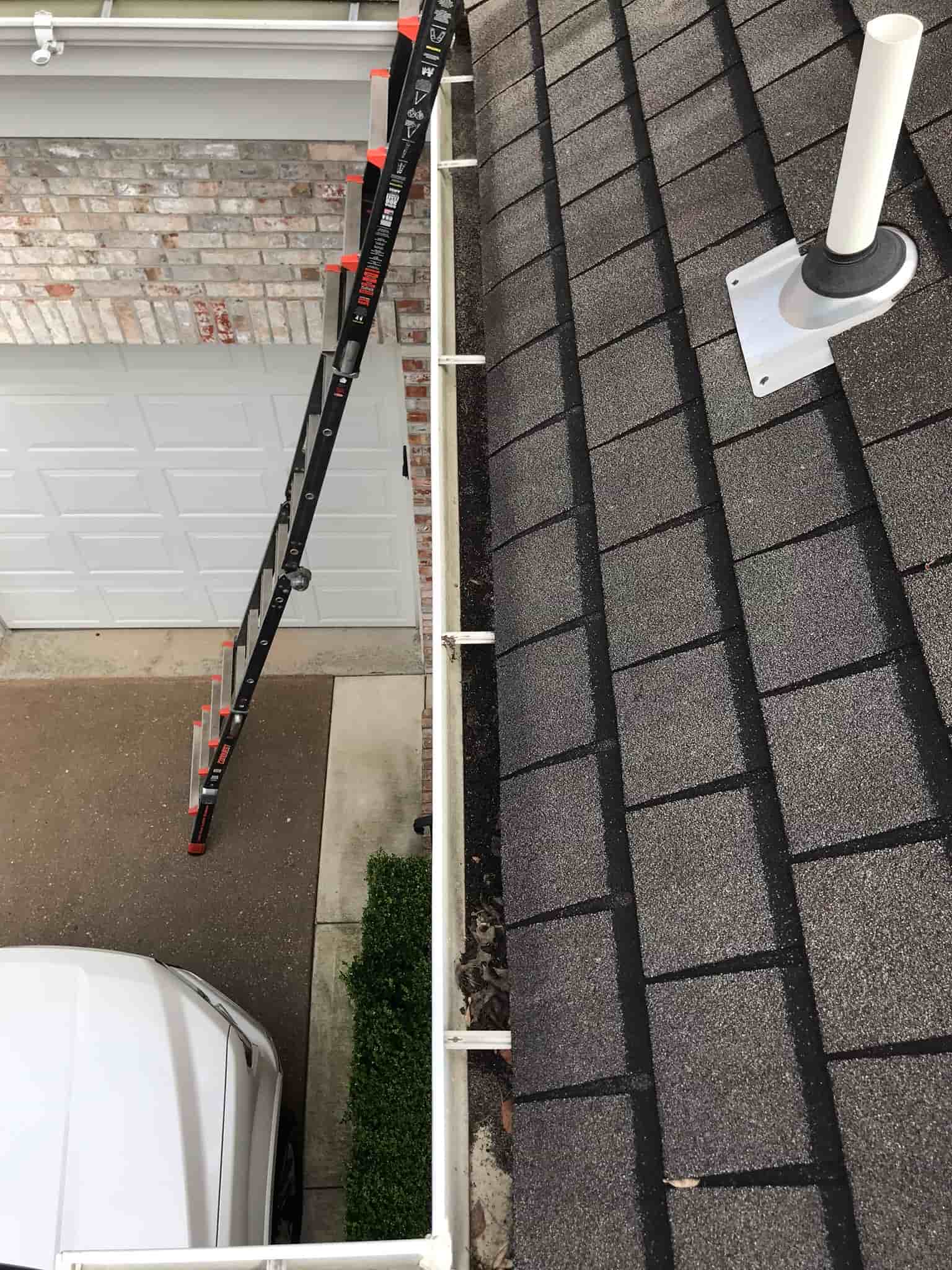 cleaning out rain gutters