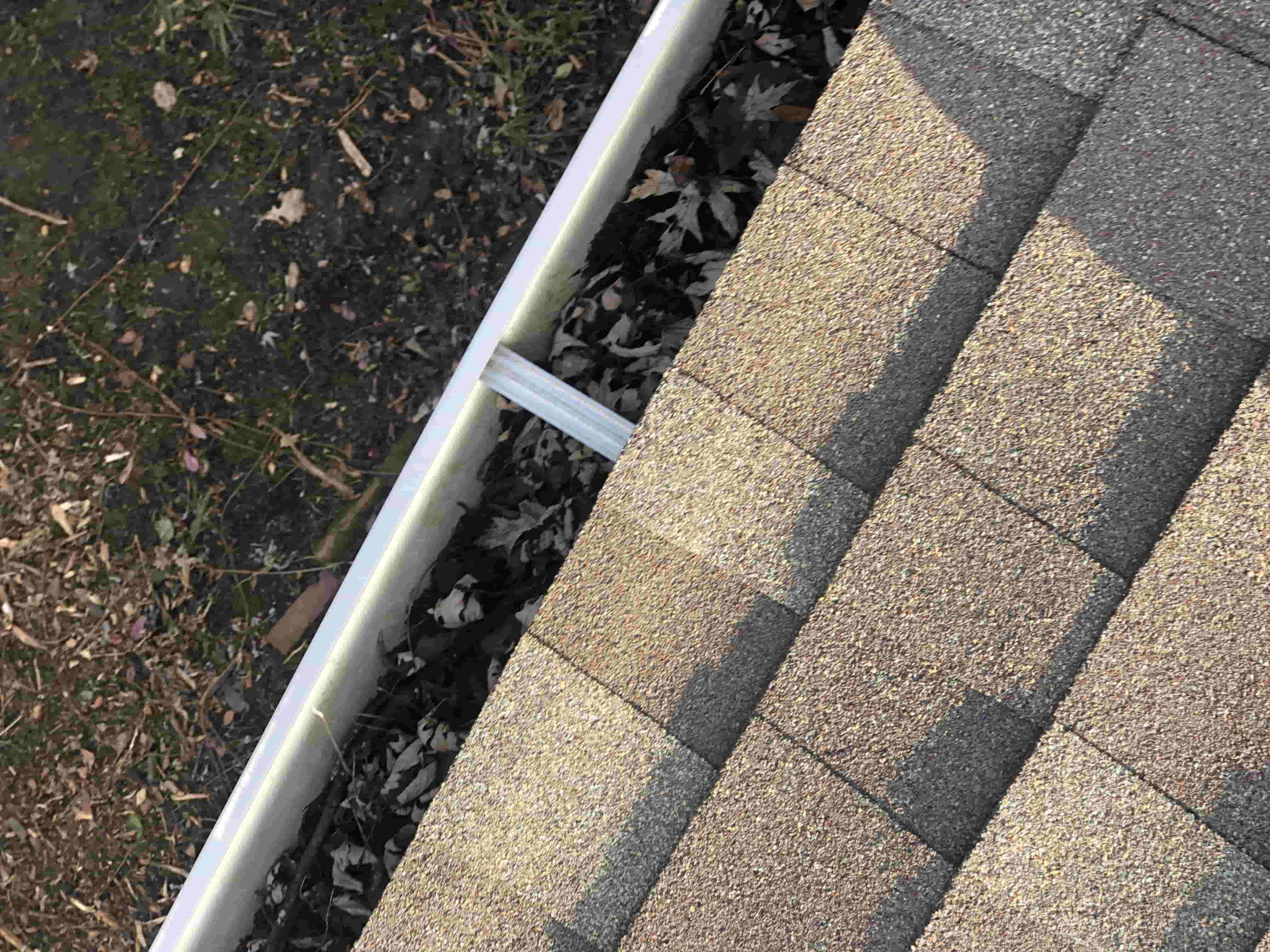 cleaning high gutters from the ground