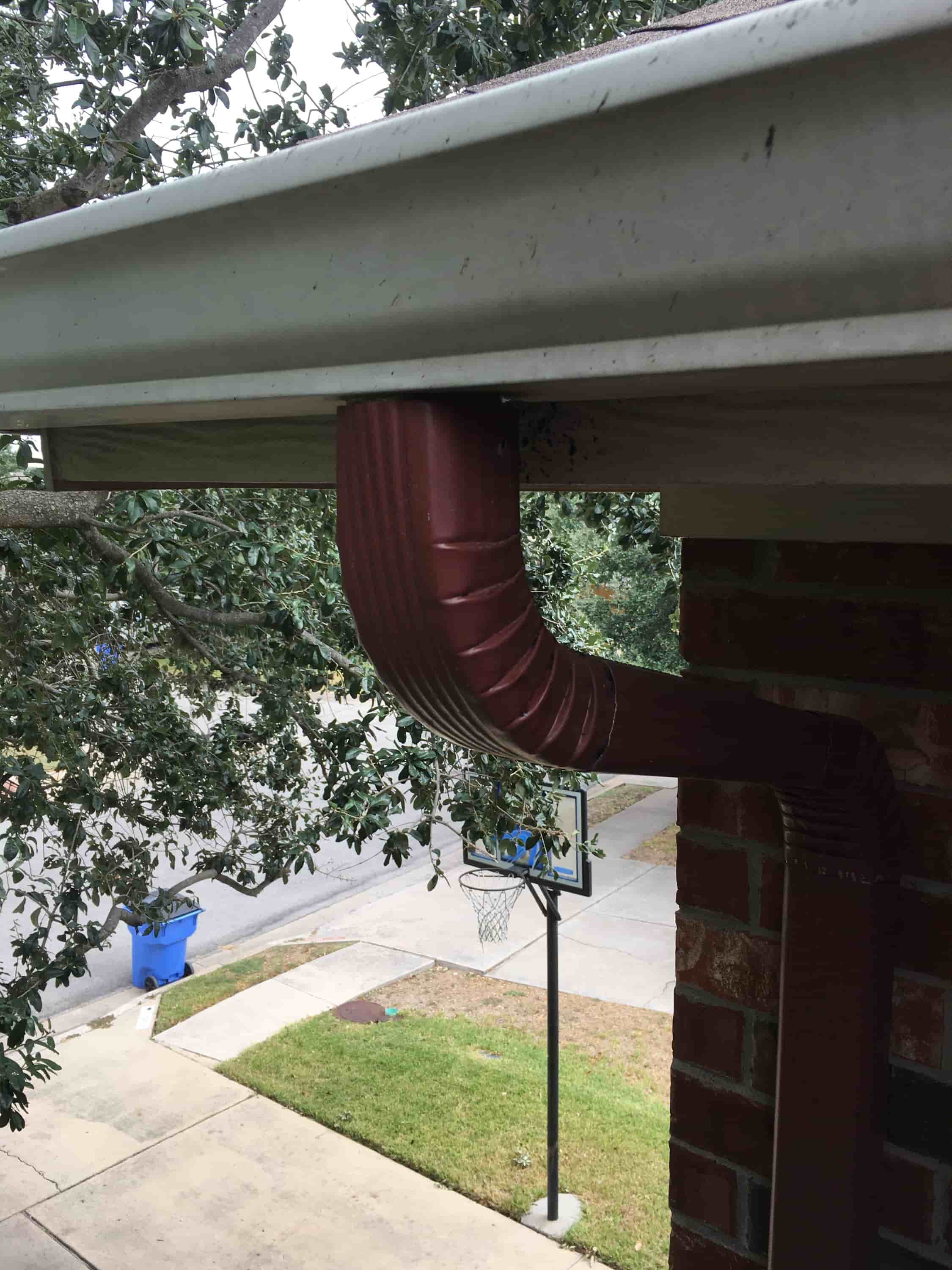 how to clean enclosed gutters