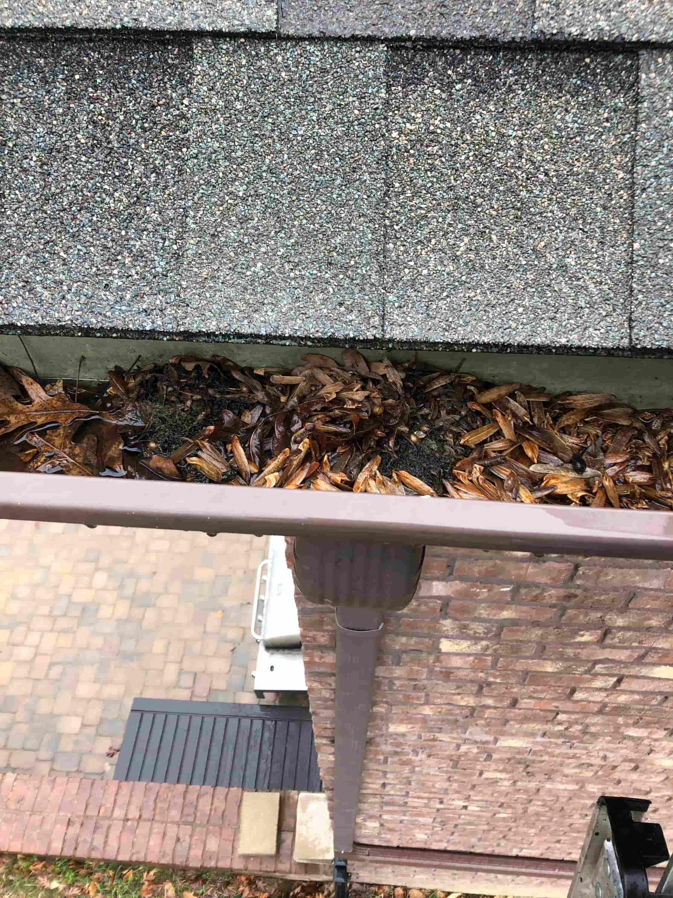 how to unclog gutter downspout