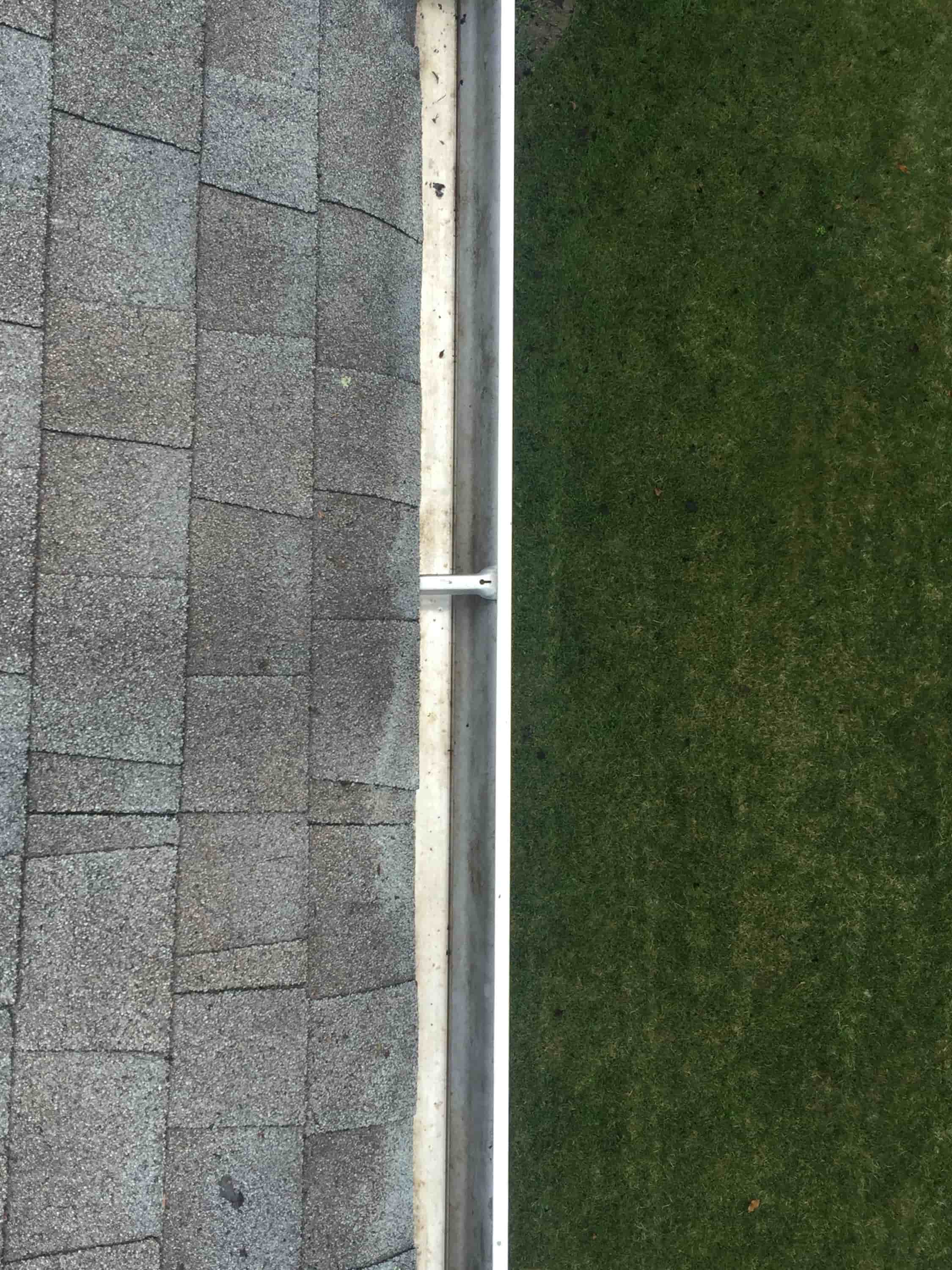 gutter cleaning with pressure washer
