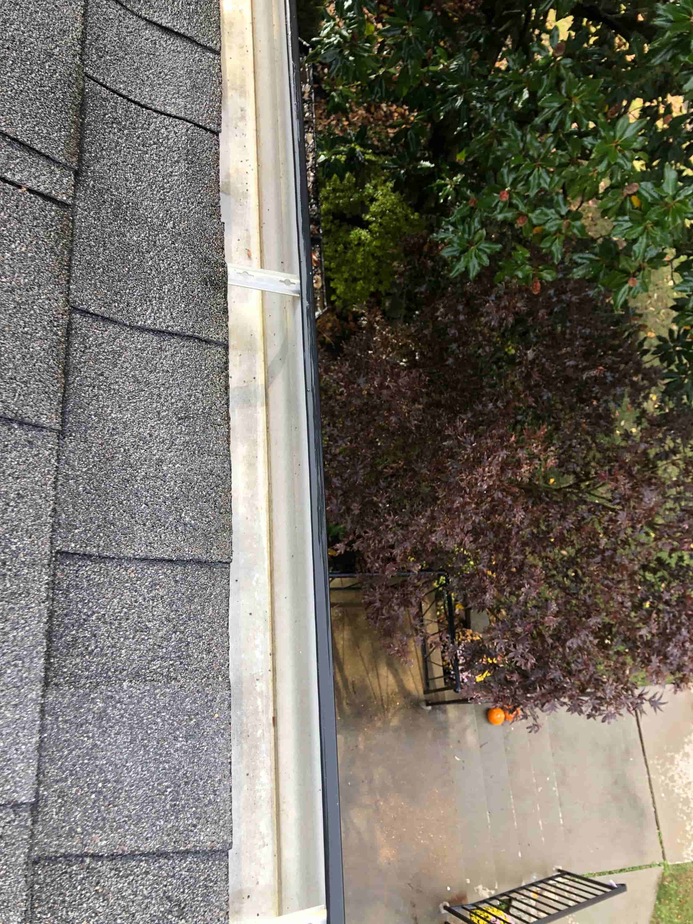 cleaning a gutter