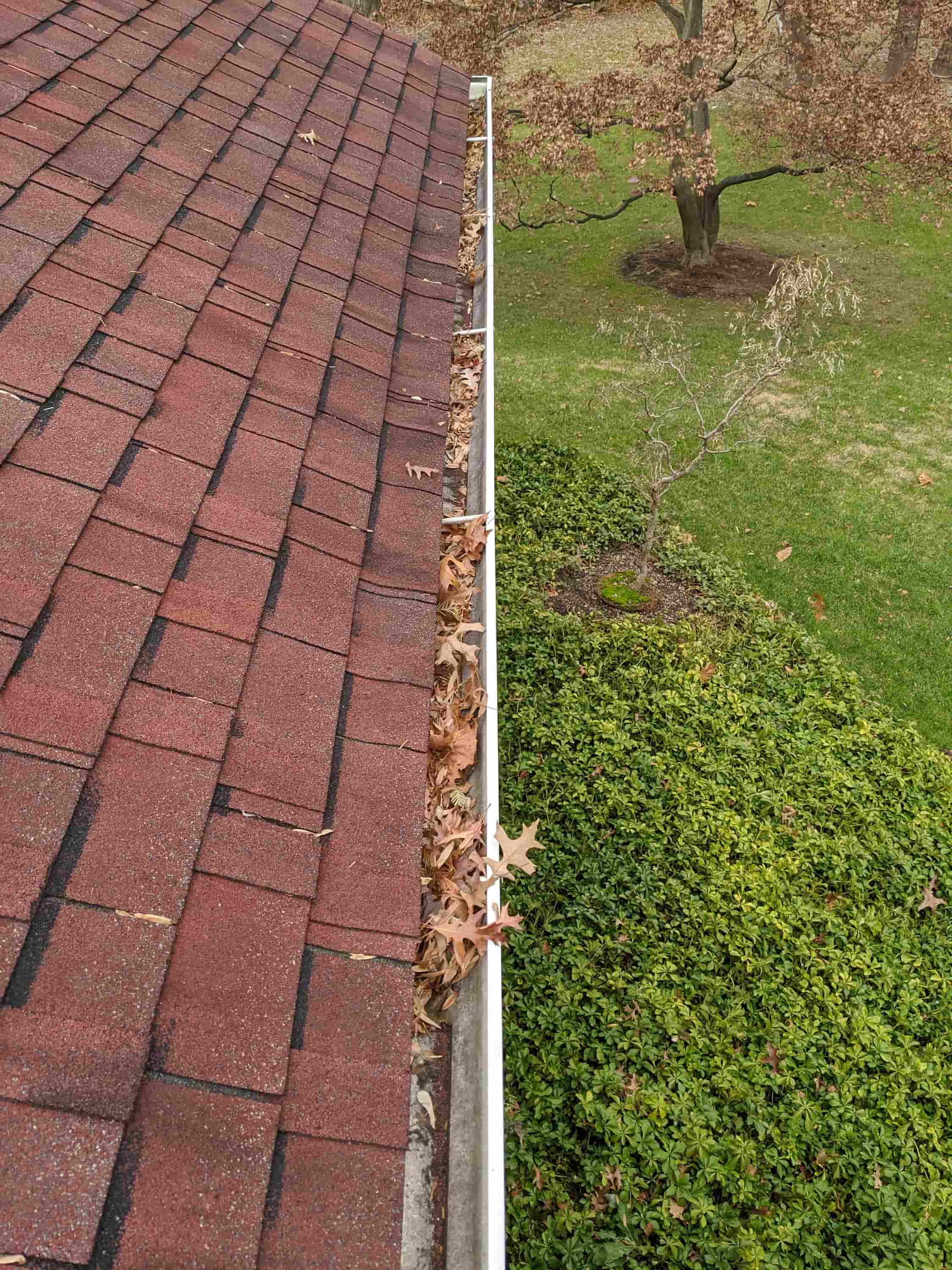 how to clean clogged gutter downspout