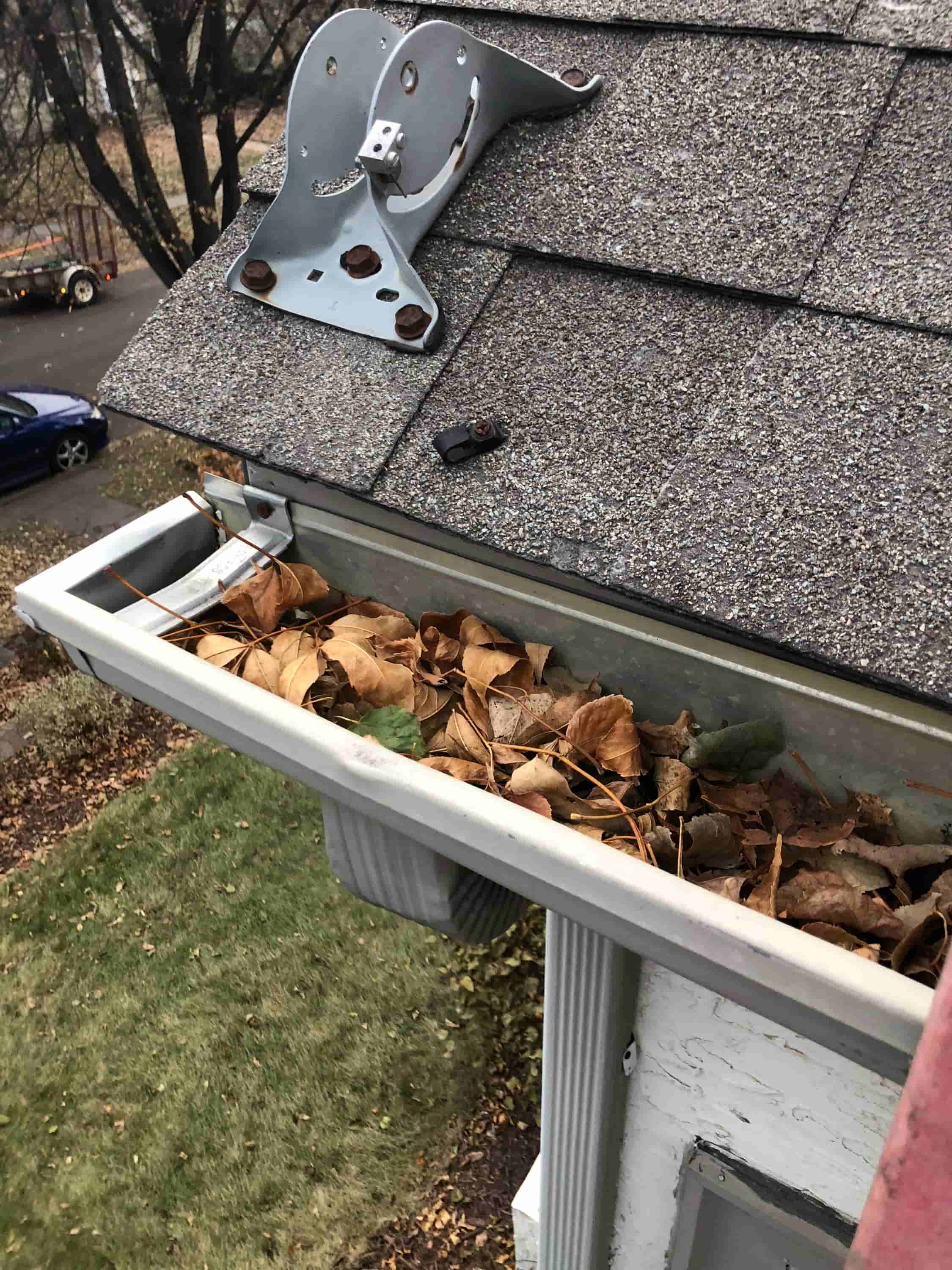 cleaning gutters from the roof