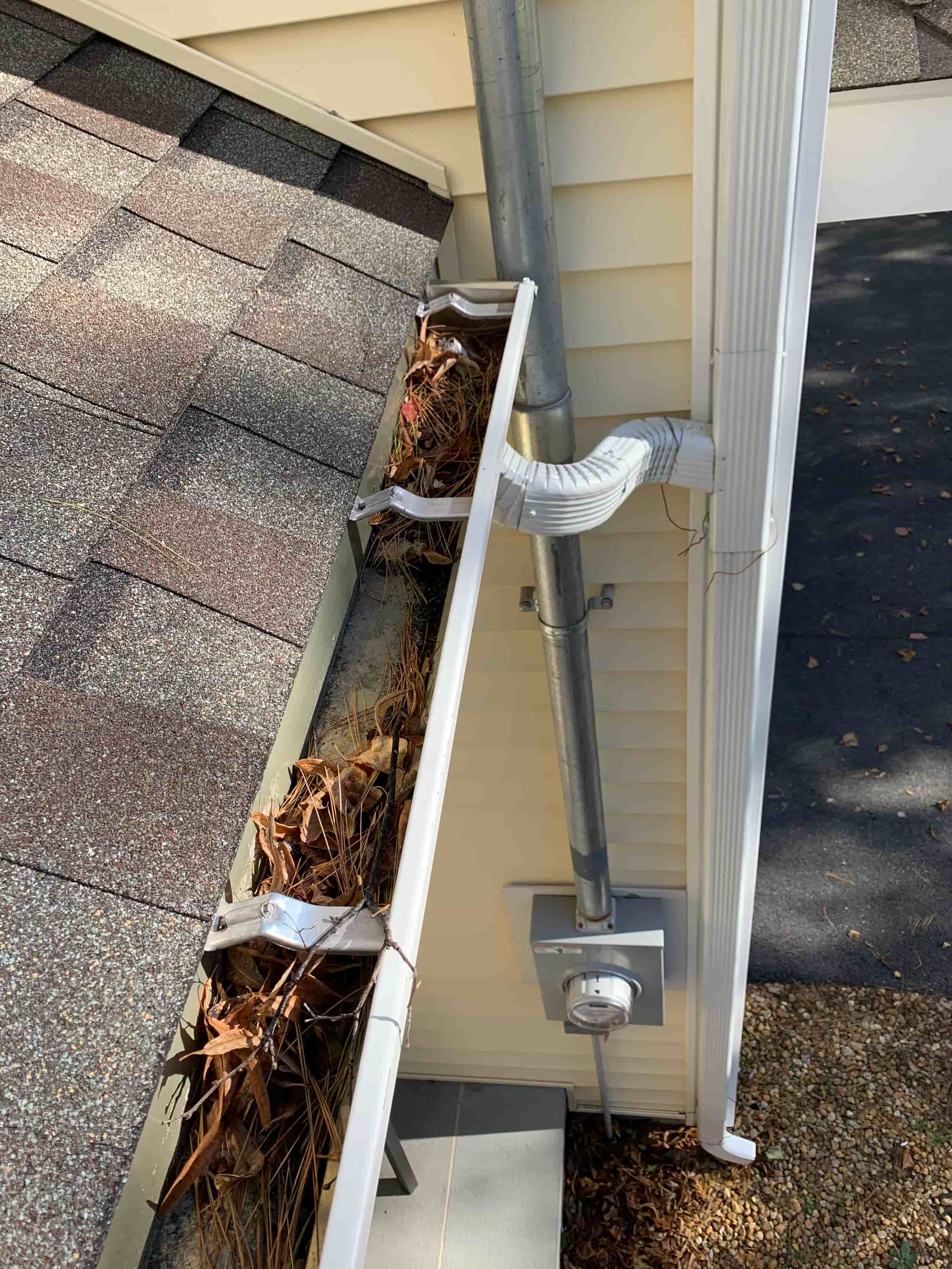 how to clean out a downspout
