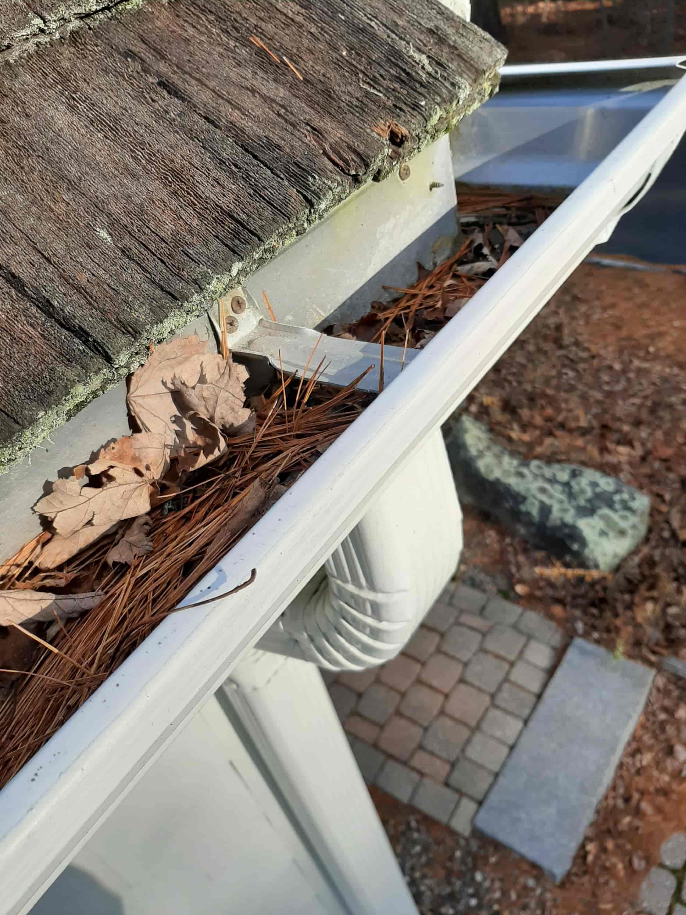 how to clean covered gutters