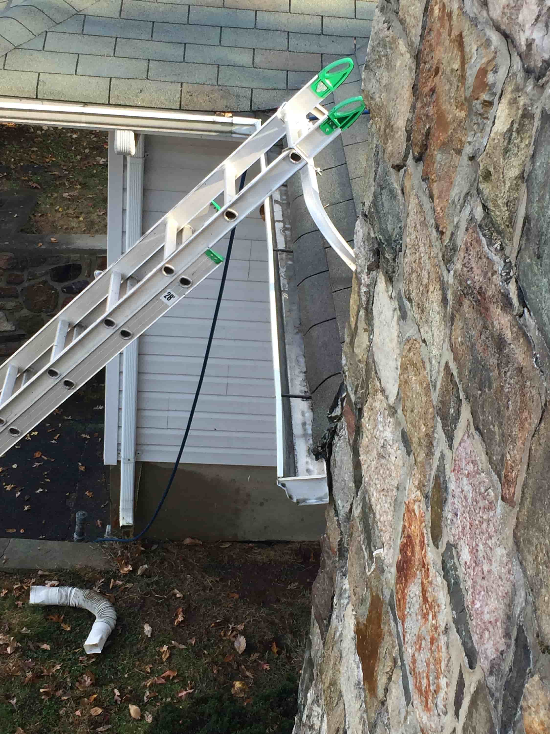 cleaning gutters from ground level