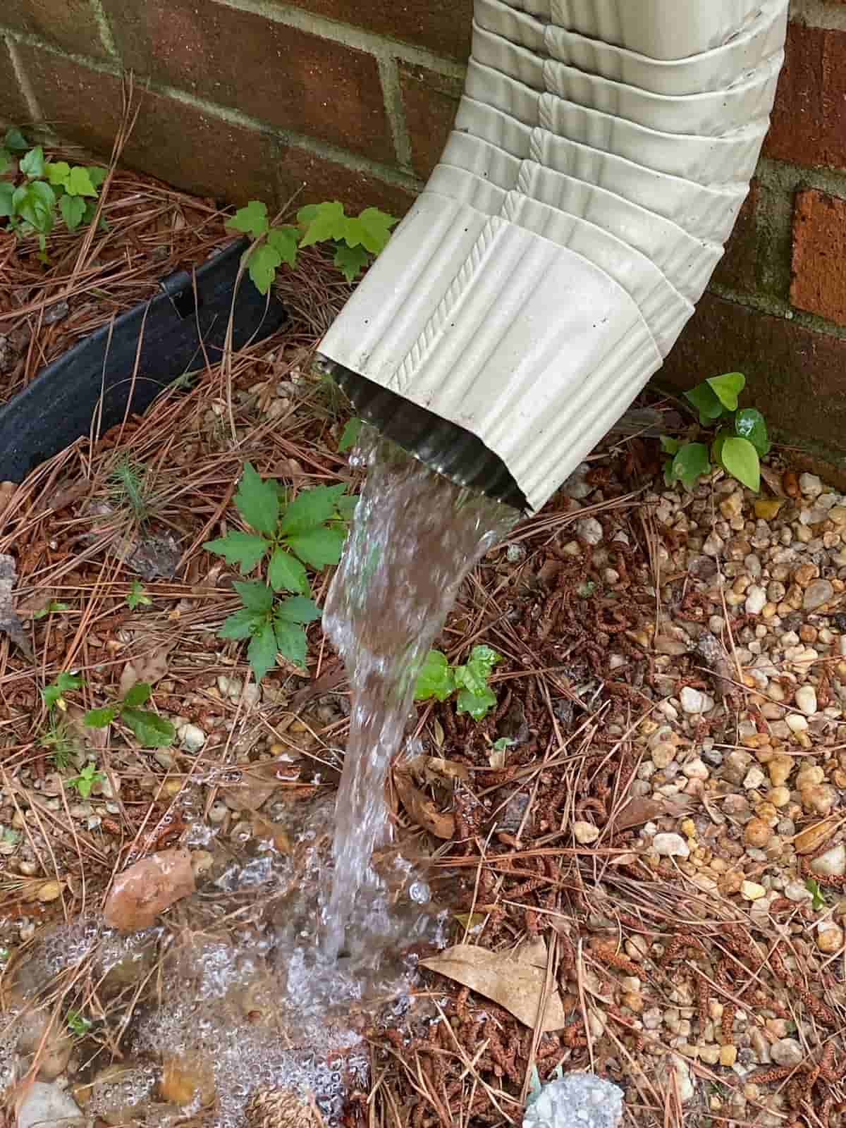 cleaning downspouts