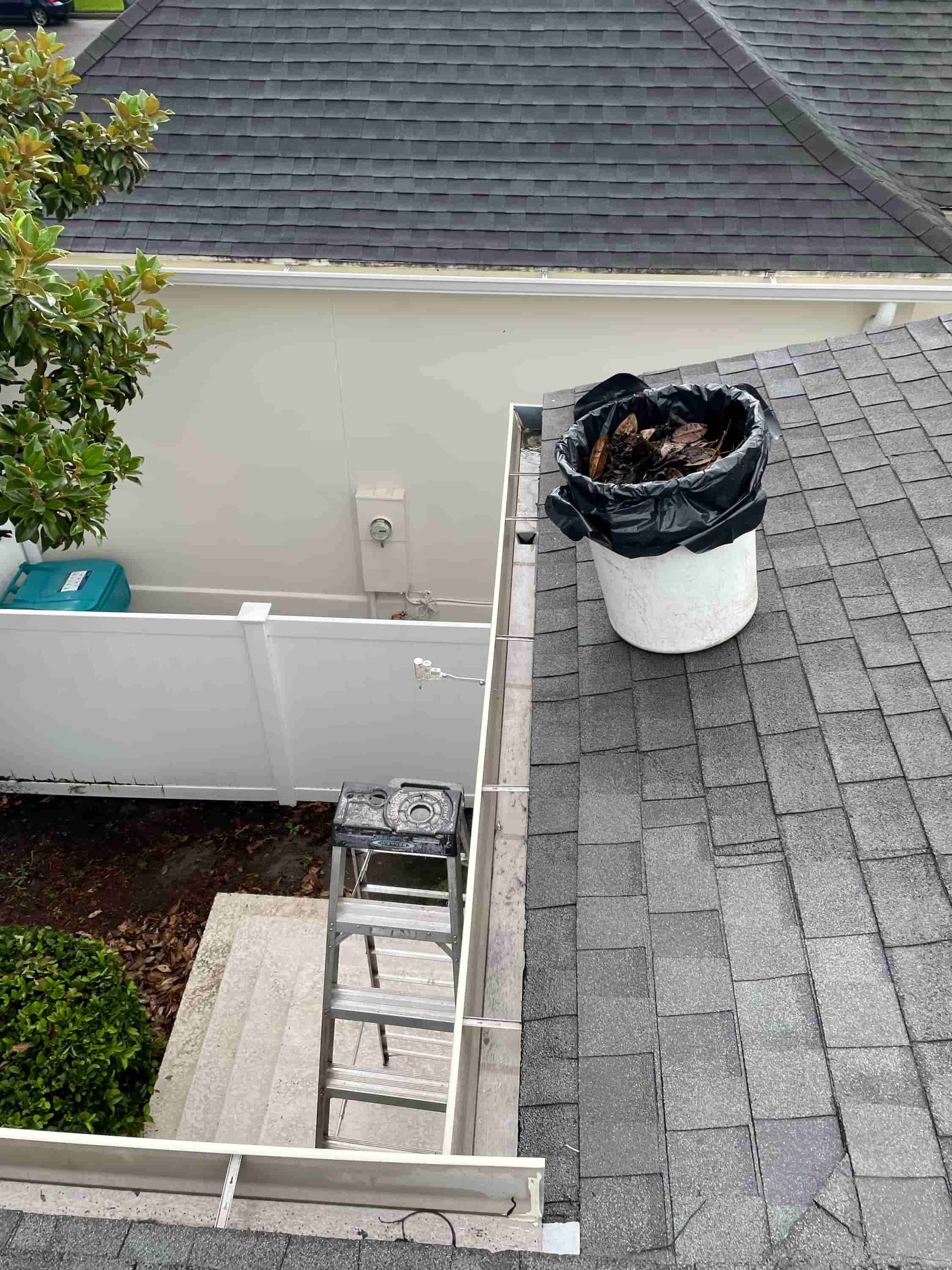 how to clean gutters with screens