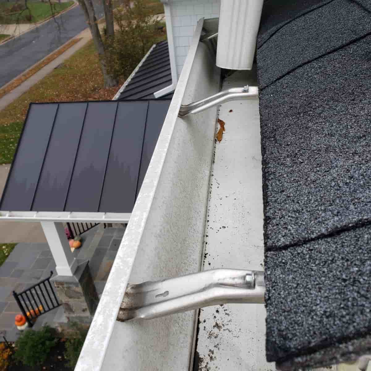 cleaning gutter downspouts