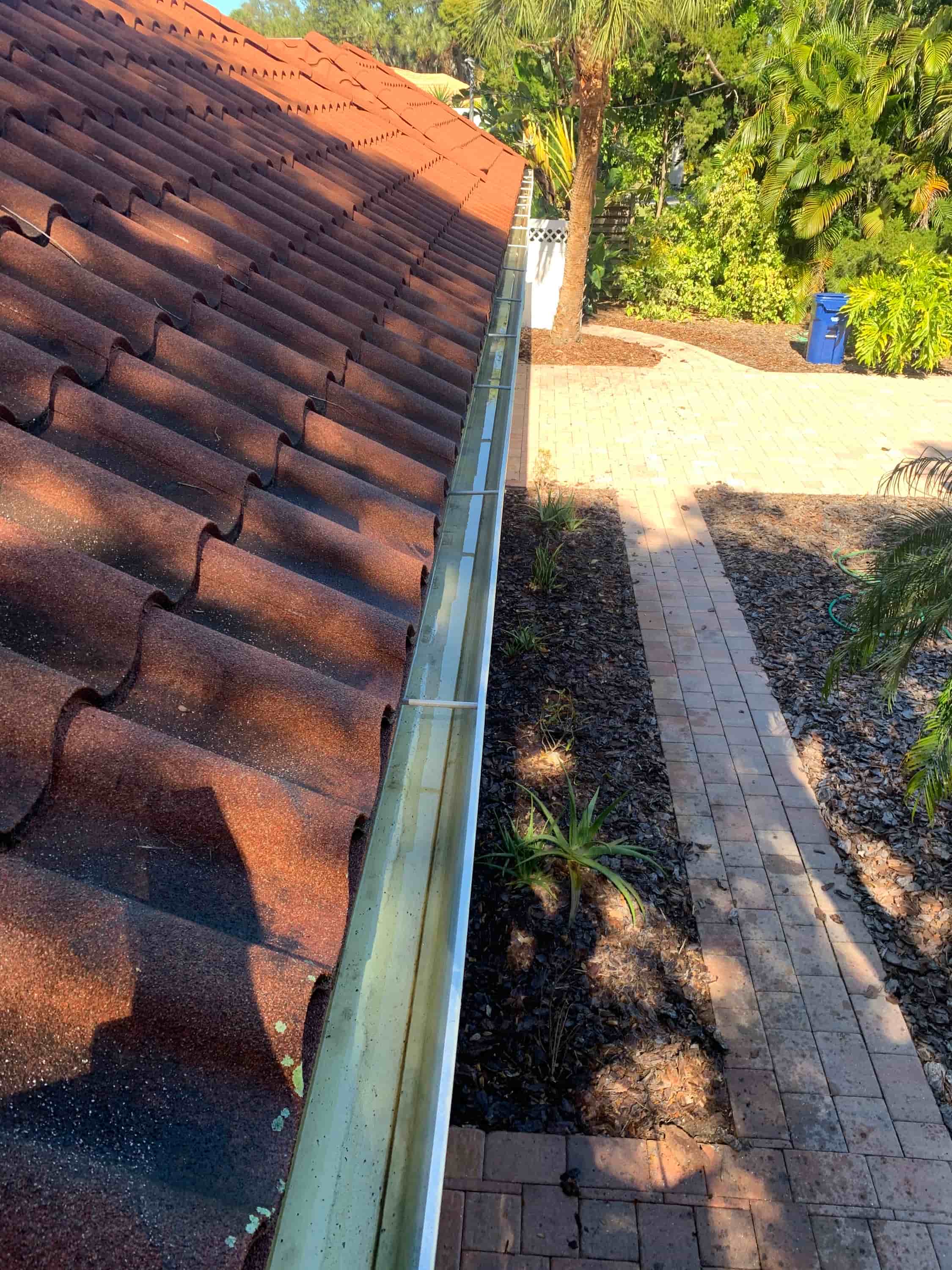 how to clean clogged gutters