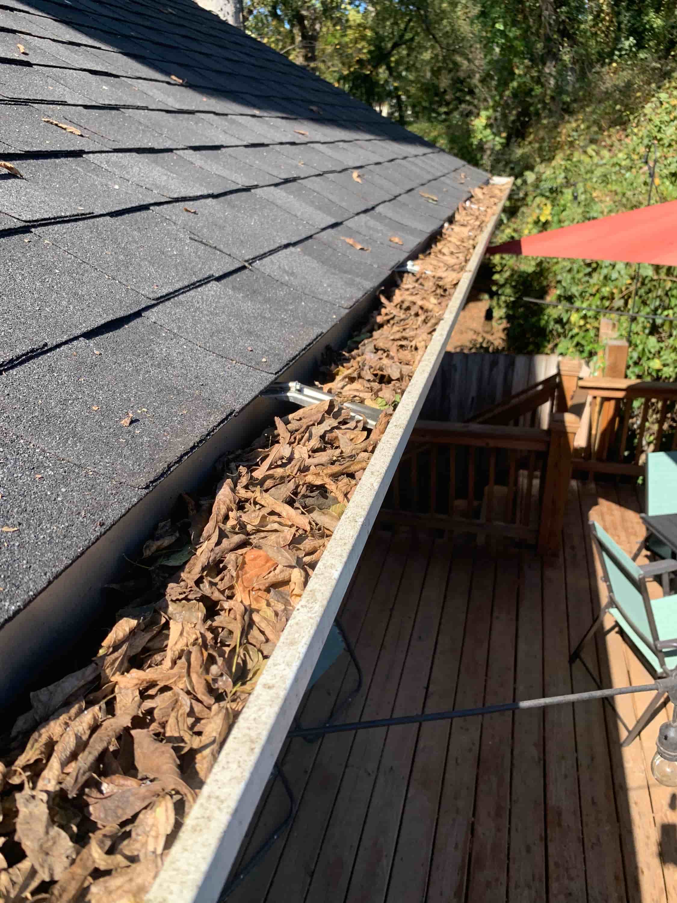 how to clean gutters with covers