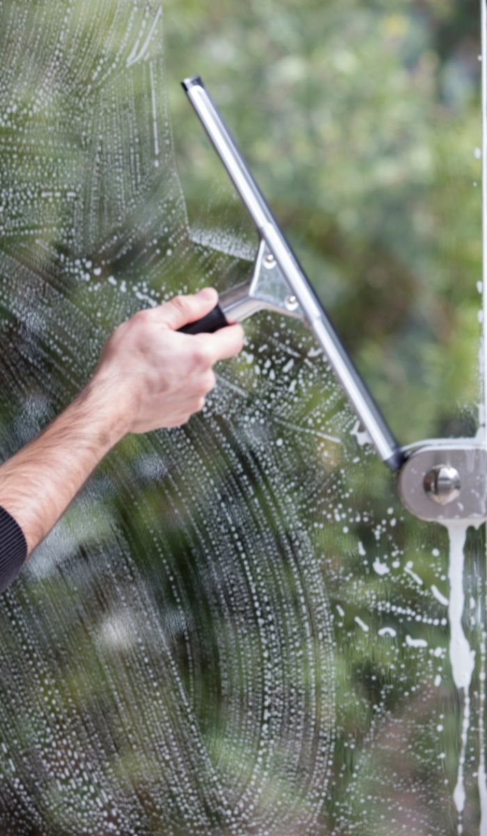 What types of cleaning services are included in the school cleaning package?