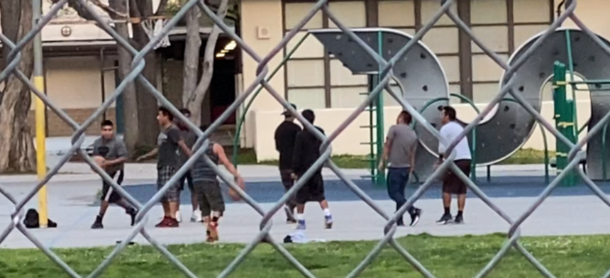 Youth playing basketball