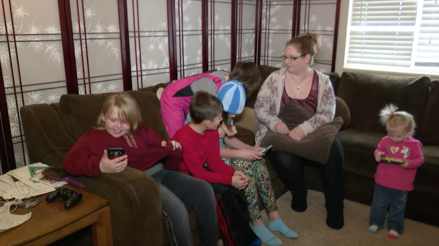 The Lannigan family, recipients of a free furnace from Peak Home Performance