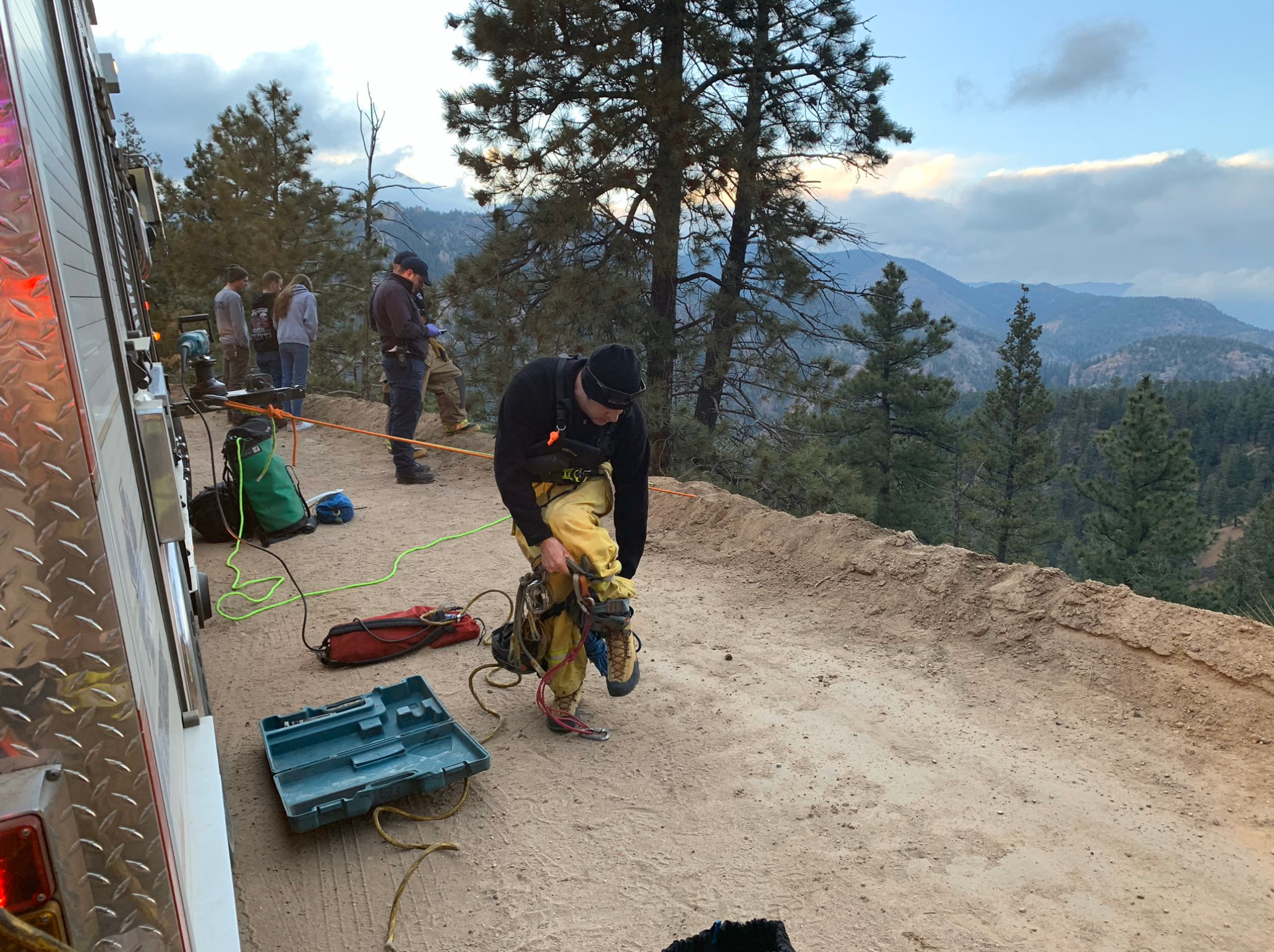 Colorado Springs firefighters rescue car from 150 yards ...