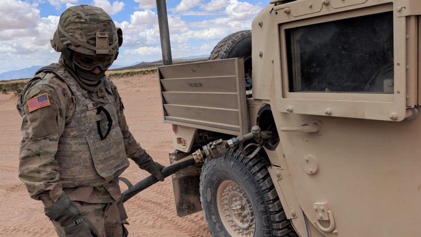 A 2nd Brigade soldier refuels a vehicle during the Strike Focus exercise in April. (Photo: David Burge/special for KVIA.com)