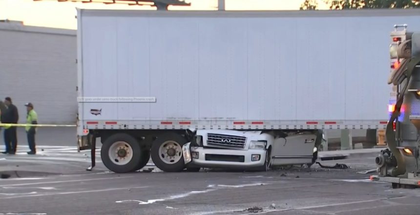 SUV under semi 3