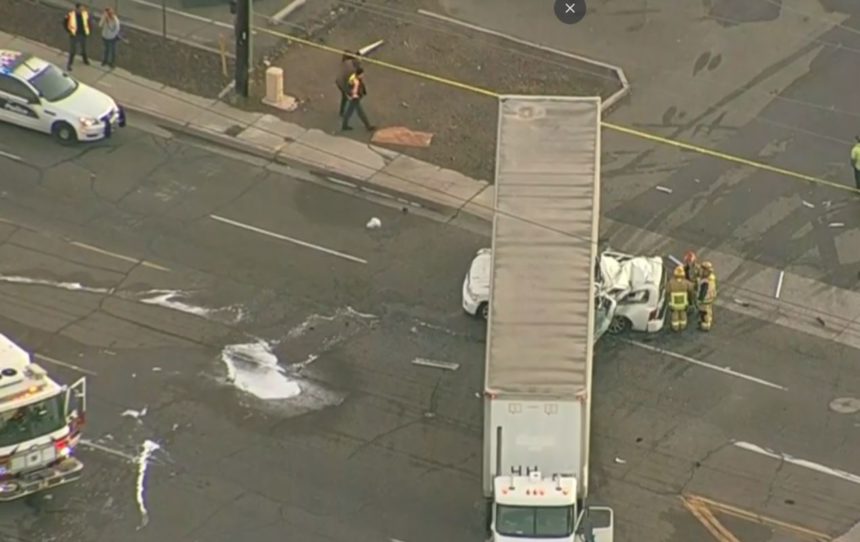 SUV under semi 4