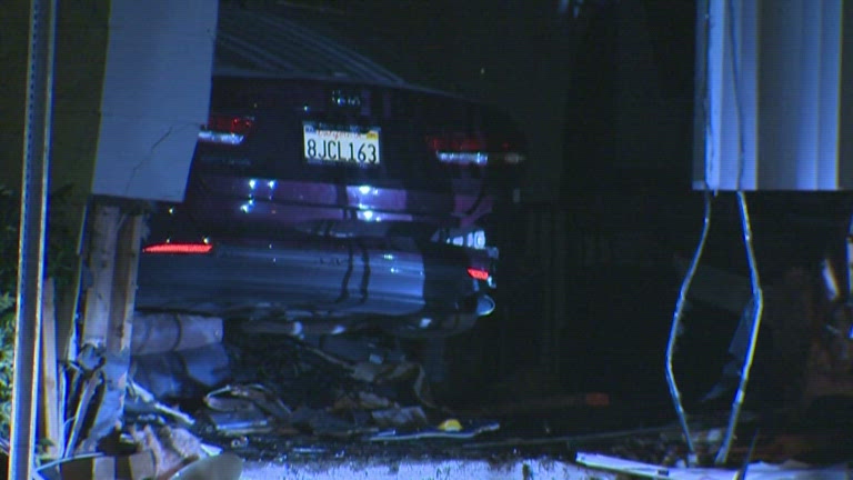 Car into house