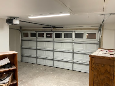 What types of garage door repairs does Garage Door Solutions handle?