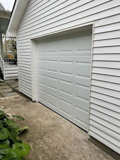 How can garage doors enhance my home's curb appeal?