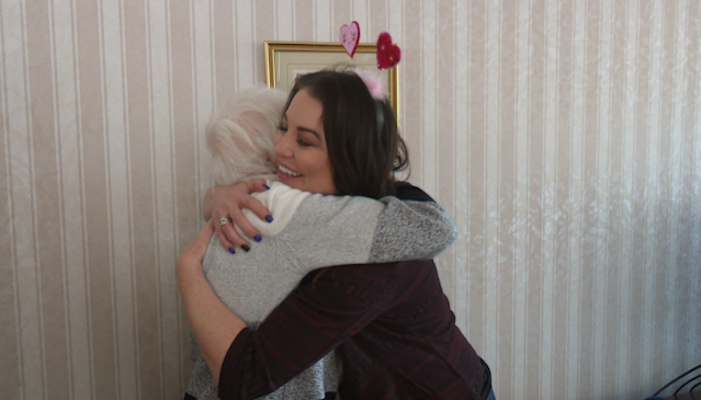 Hugging a senior
