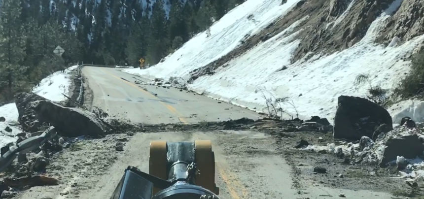 Highway 21 cleanup6_ A large boulder fell and dragged across the highway, gouging the pavement.