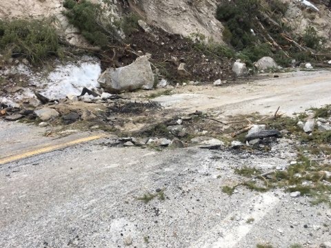 Highway 21 cleanup8_ A large boulder fell and dragged across the highway, gouging the pavement.