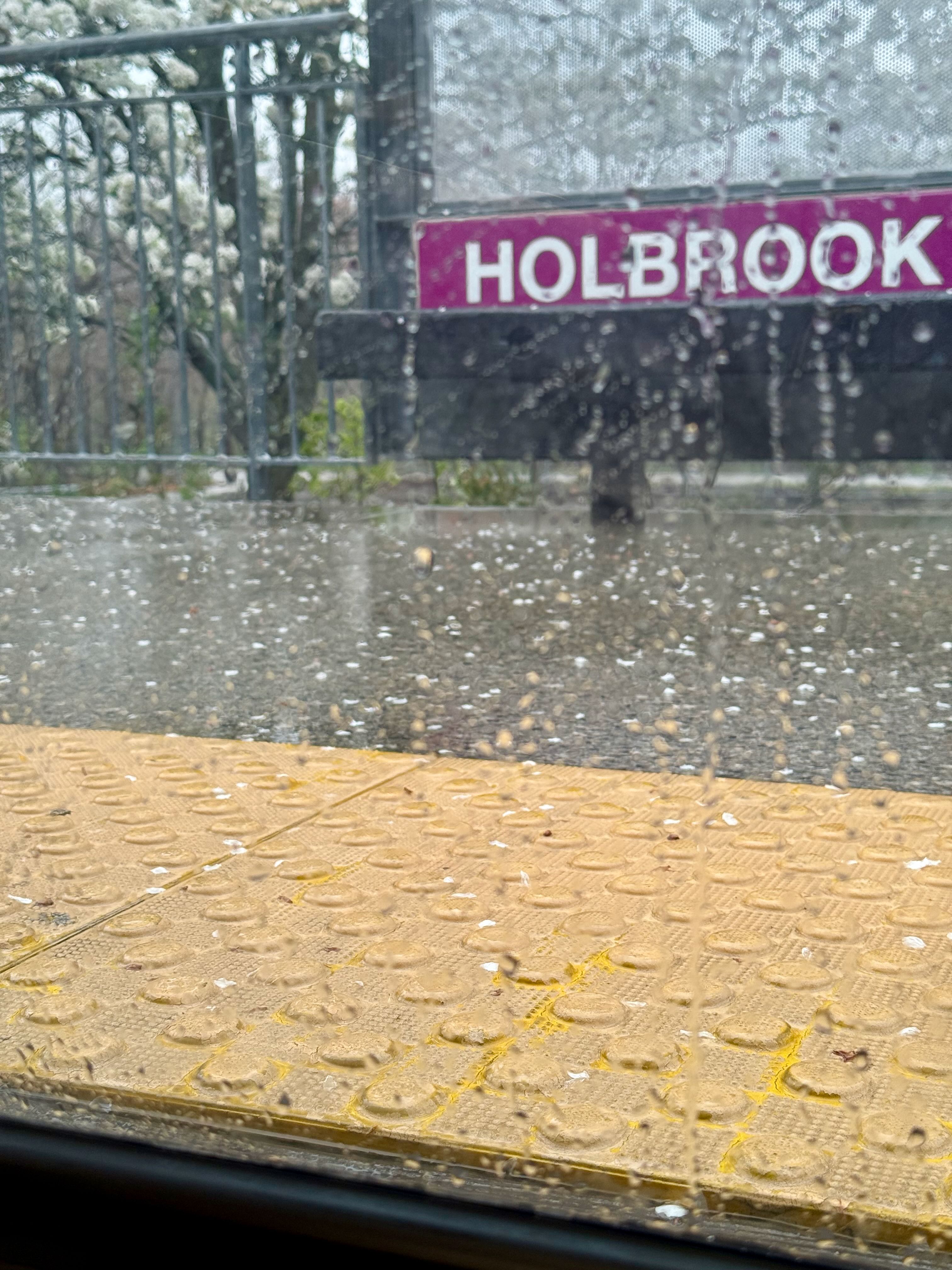 Picture of platform through a rainy window of Holbrook/Randolph Station