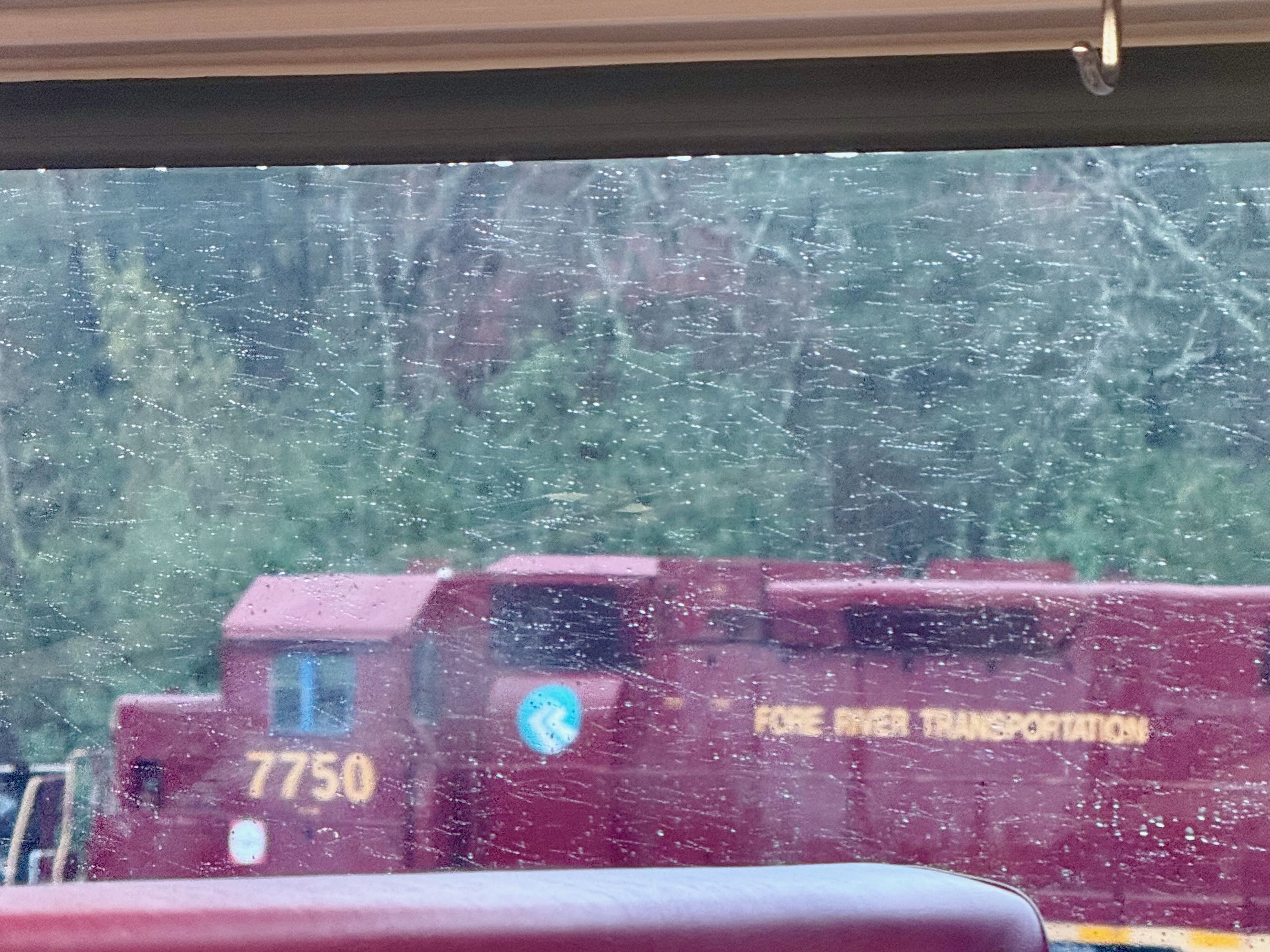 Blurry photo of a locomotive with “Fore River Transportation” written on the side